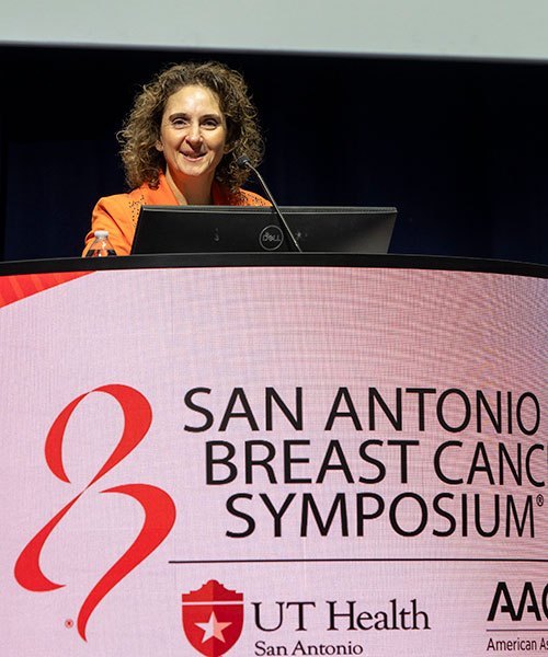 San Antonio, TX - SABCS 2024 San Antonio Breast Cancer Symposium  @ SABCS Virginia Kaklamani, MD,  during Opening remarks here today, Wednesday December 11, 2024. during the San Antonio Breast Cancer Symposium being held at the Henry B. Gonzalez Convention Center in San Antonio, TX. The symposium features physicians, researchers, patient advocates and healthcare professionals from over 90 countries with the latest research on breast cancer treatment and prevention. Photo by © MedMeetingImages/Todd Buchanan 2024 Technical Questions: todd@medmeetingimages.com