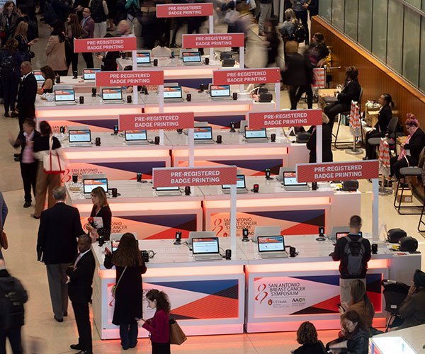 San Antonio, TX - SABCS 2024 San Antonio Breast Cancer Symposium  @ SABCS Attendees during Exhibit Hall opening here today, Wednesday December 11, 2024. during the San Antonio Breast Cancer Symposium being held at the Henry B. Gonzalez Convention Center in San Antonio, TX. The symposium features physicians, researchers, patient advocates and healthcare professionals from over 90 countries with the latest research on breast cancer treatment and prevention. Photo by © MedMeetingImages/Todd Buchanan 2024 Technical Questions: todd@medmeetingimages.com