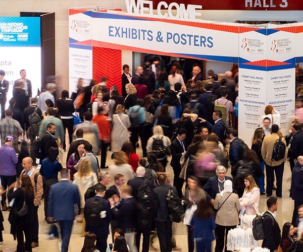 San Antonio, TX - SABCS 2024 San Antonio Breast Cancer Symposium  @ SABCS Attendees during Exhibit Hall opening here today, Wednesday December 11, 2024. during the San Antonio Breast Cancer Symposium being held at the Henry B. Gonzalez Convention Center in San Antonio, TX. The symposium features physicians, researchers, patient advocates and healthcare professionals from over 90 countries with the latest research on breast cancer treatment and prevention. Photo by © MedMeetingImages/Todd Buchanan 2024 Technical Questions: todd@medmeetingimages.com